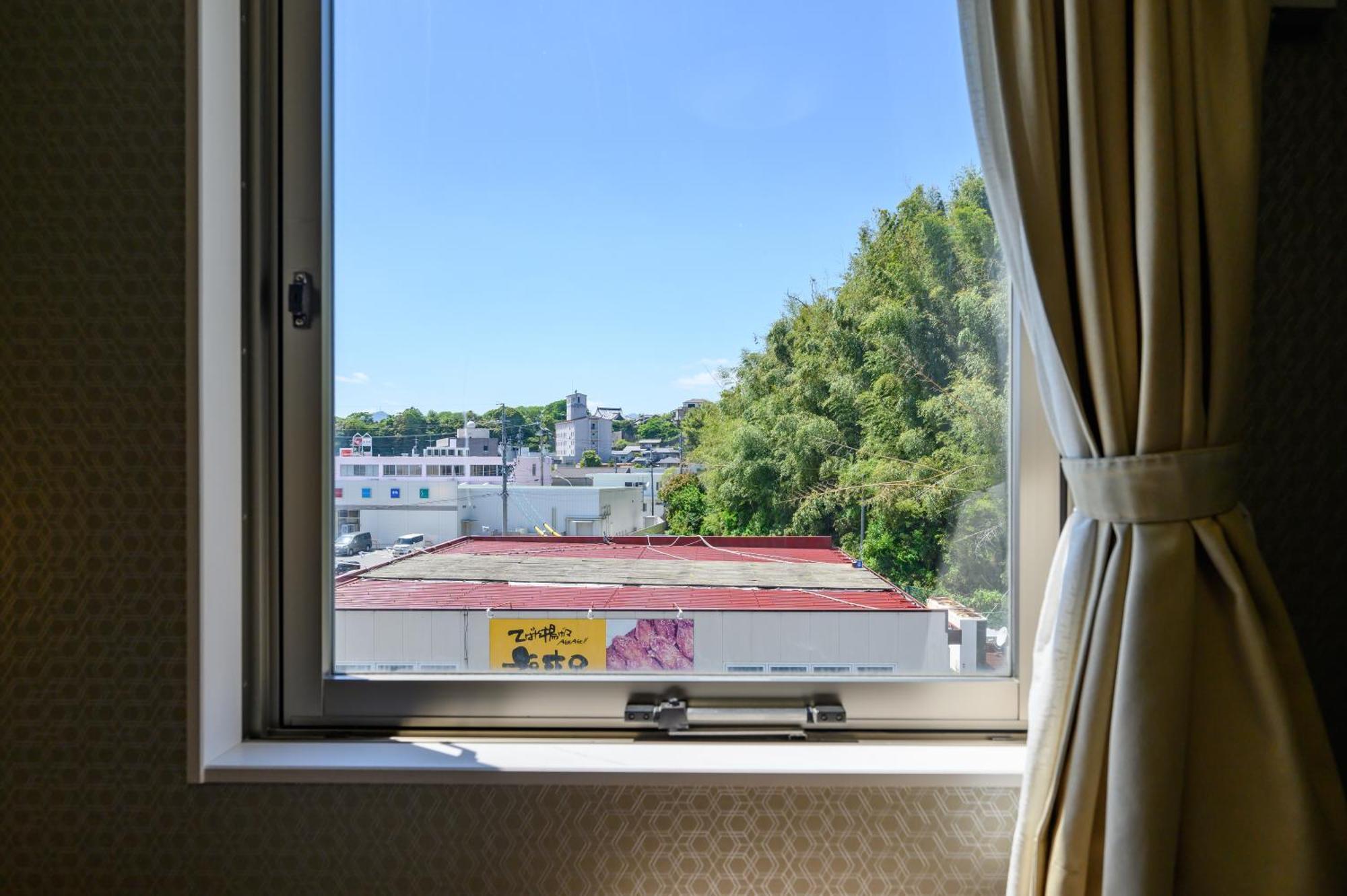 Hotel Econo Камеяма Екстериор снимка